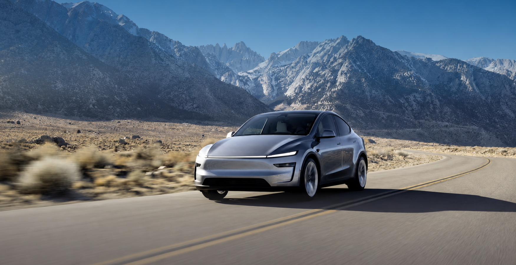 Tesla Model Y vor Bergkulisse